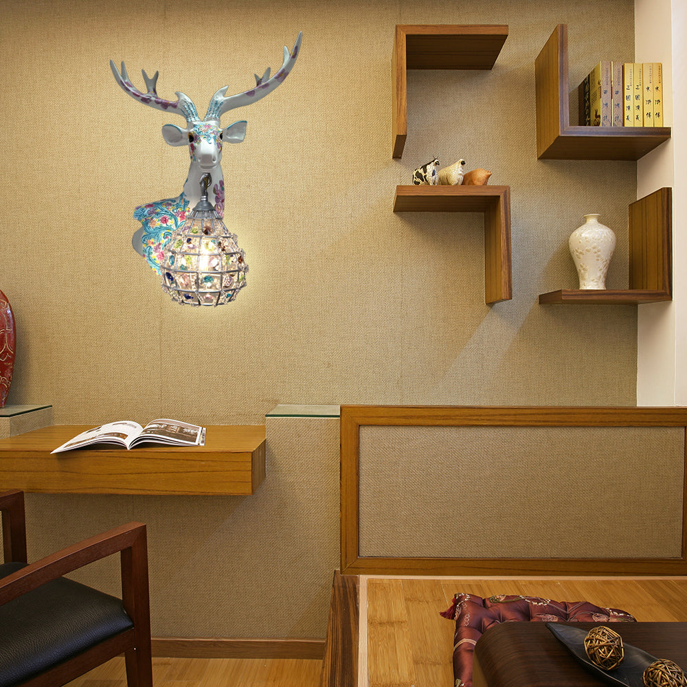 Application de cerf traditionnelle 1 Éclairage mural en résine lumineuse en noir / rose / jaune pour chambre avec une nuance de cristal de gouttelettes, droite / gauche