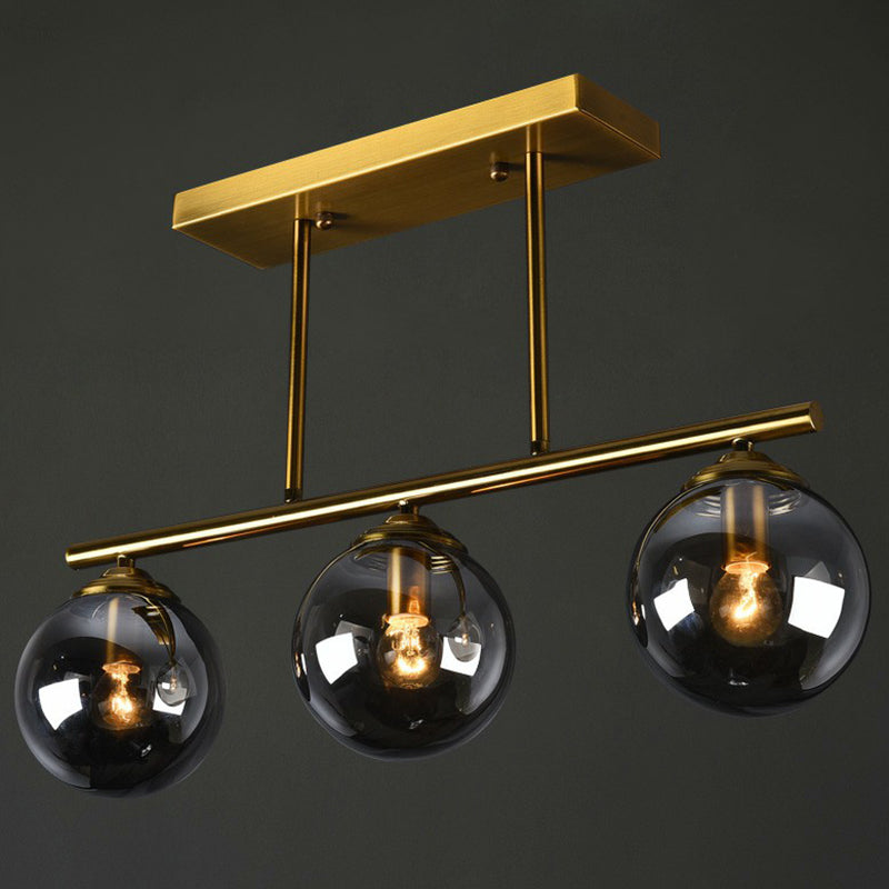 Brass Linear Island Light Fixture Postmodern Metal Ceiling Light with Globe Glass Shade