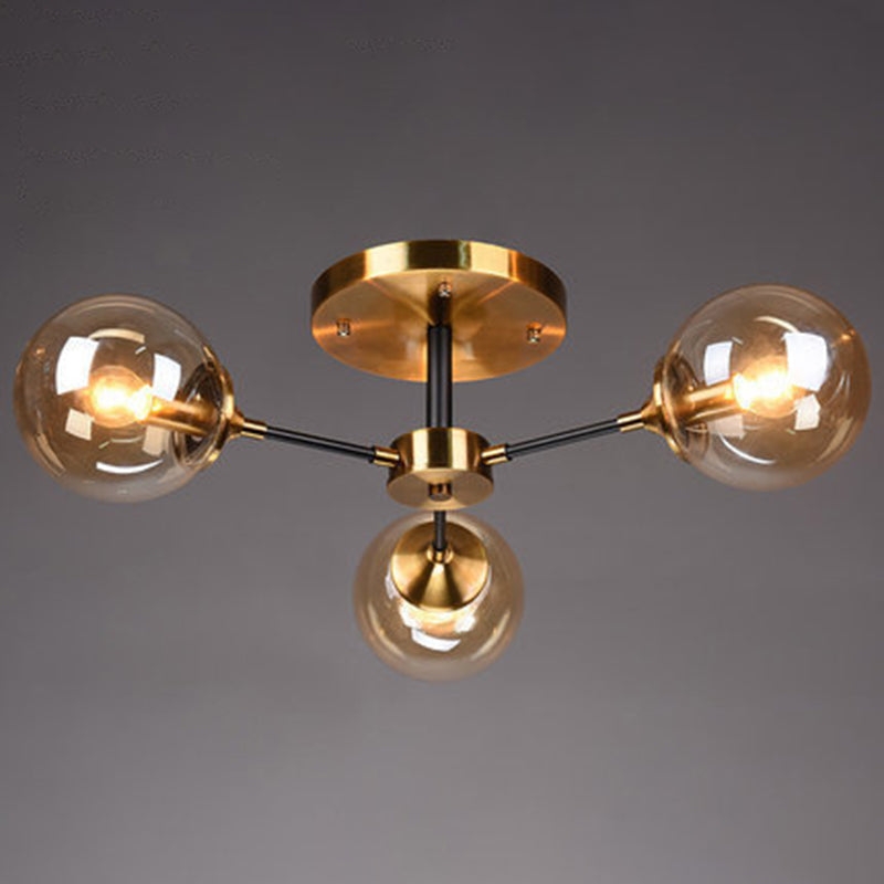 Lámpara de techo radial con acabado de latón, iluminación semimontada de metal posmoderno con pantalla de cristal esférica