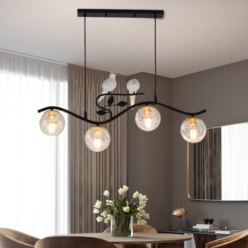 Metal Wavy Island Pendant Minimalist 4-Light Black Hanging Lamp with Ball Glass Shade and Bird Deco