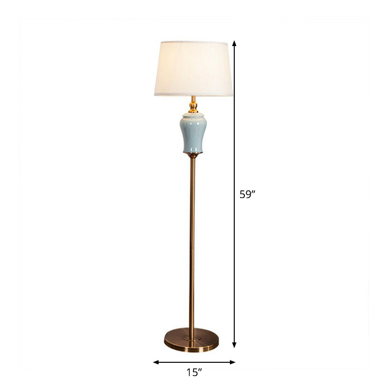 Moderne taps toelopende trommelvloer lichte stof 1 lamp woonkamer opstaan lamp in het wit