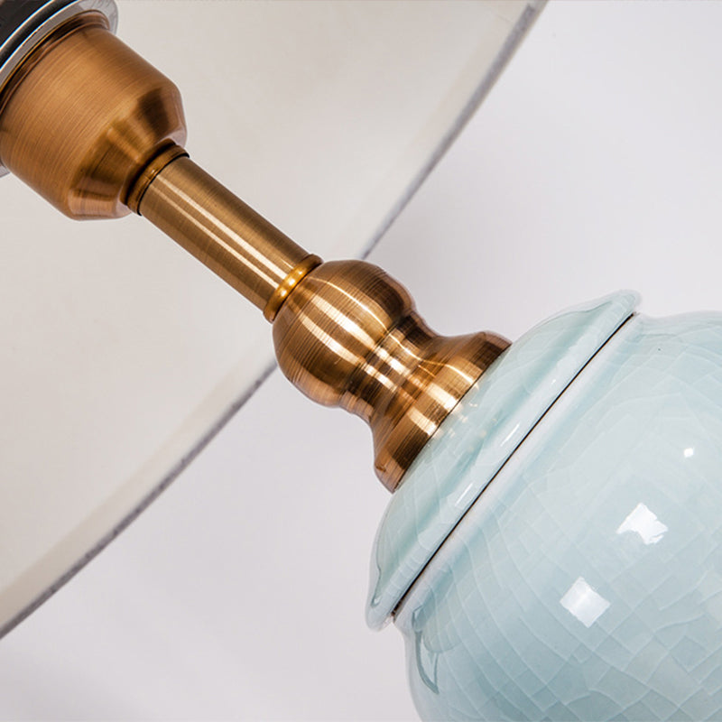 Moderne taps toelopende trommelvloer lichte stof 1 lamp woonkamer opstaan lamp in het wit