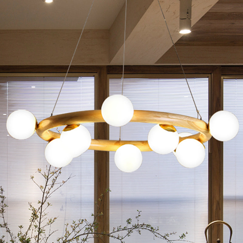Lumière de suspension à anneau en bois avec une nuance à bulles