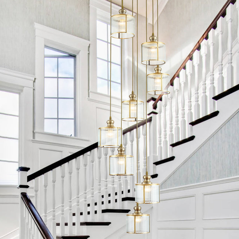 Cylindre de finition en laiton Pendre plusieurs lampes Postmodern Verre côtelée Éclairage de suspension pour escalier