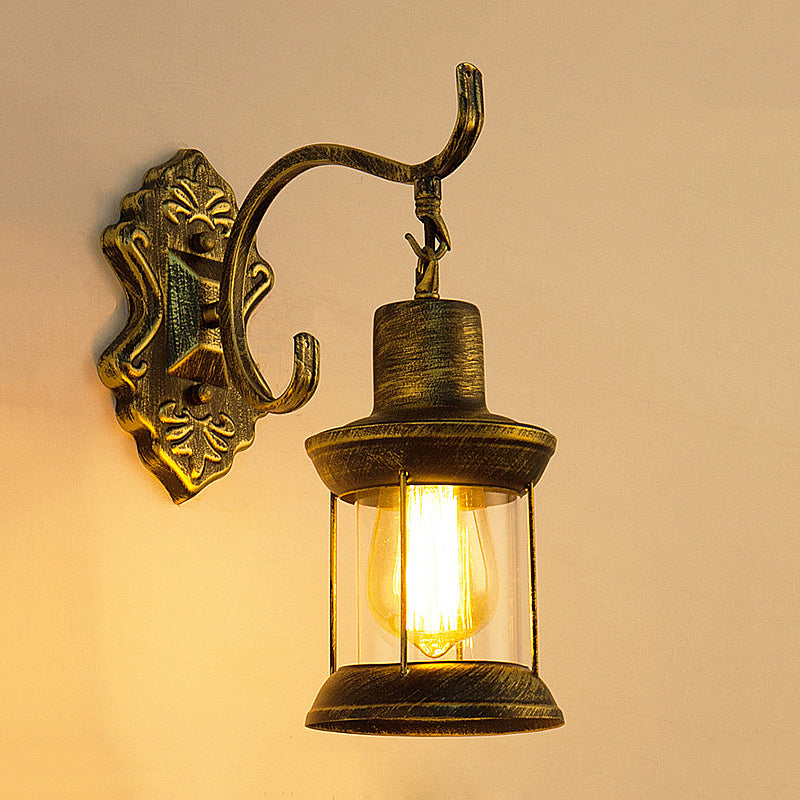 1 Bulb Kerosene Wall Mounted Light Fixture Rustic Style Aged Bronze Clear Glass Lighting with Carved Pattern