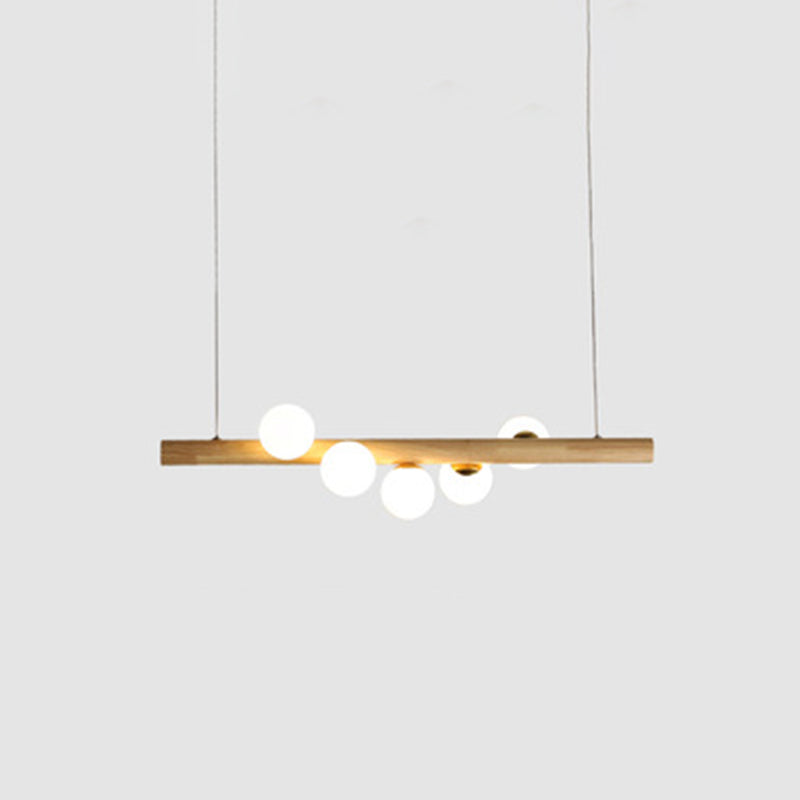 Nordic Linear Wood Island Pendant with Globe Shape Glass Island Light in Beige for Dining Room