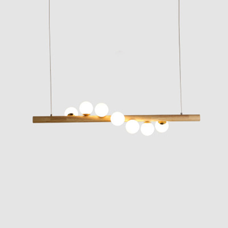 Nordic Linear Wood Island Pendant with Globe Shape Glass Island Light in Beige for Dining Room
