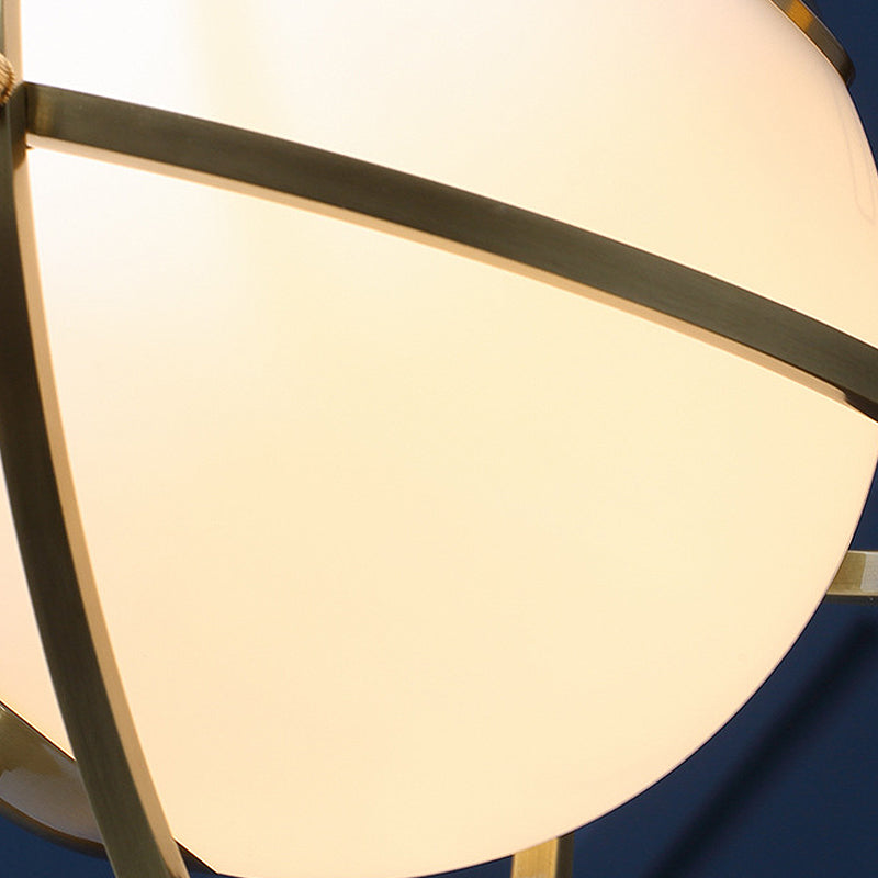 Accesorio de iluminación colgante de órbita de latón posmoderno 1 cabeza de metal colgante con sombra de vidrio blanco