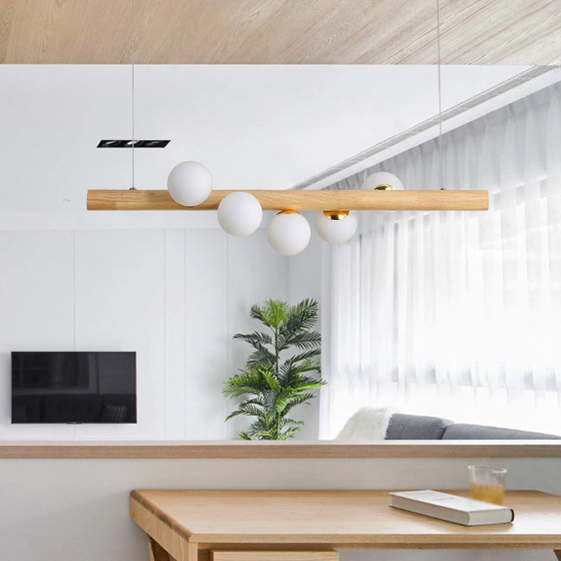 Minimalismo moderno in legno Isola lineare Illuminazione a ciondolo sfera Sfera Glass Island Affermazione Luce per soggiorno