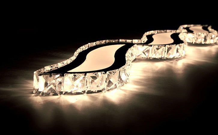 Moderno lussuoso lussuoso isola a pendente illuminazione ondata prismatica a soffitto di cristallo ottico per soggiorno