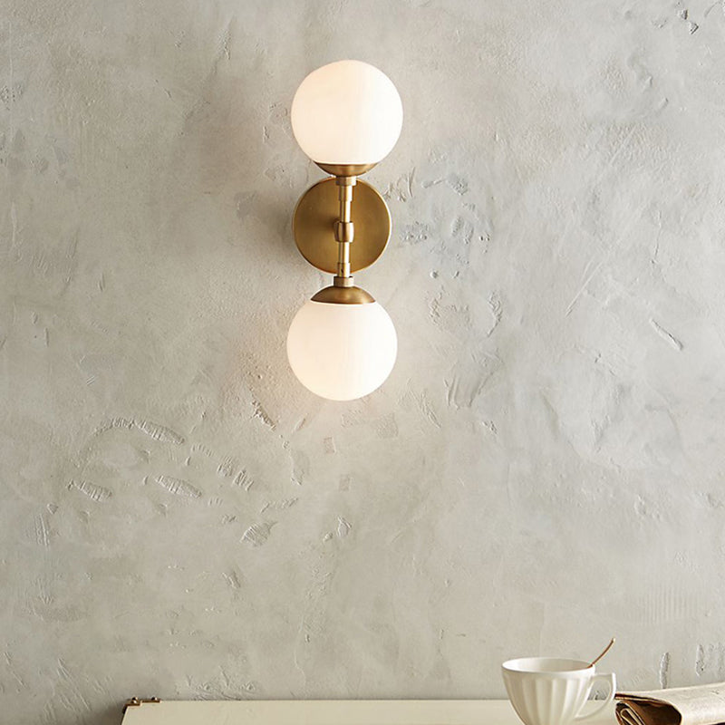 Armed Double Globe Wall Sconce Light Minimalist Milky Glass 2-Light Wall Mount Lamp in Brass