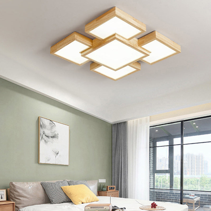 Spleißen von Quadraten in der Nähe der Deckenleuchte. Einfache LED-Schlafzimmer-Deckenleuchte aus Holz aus Holz