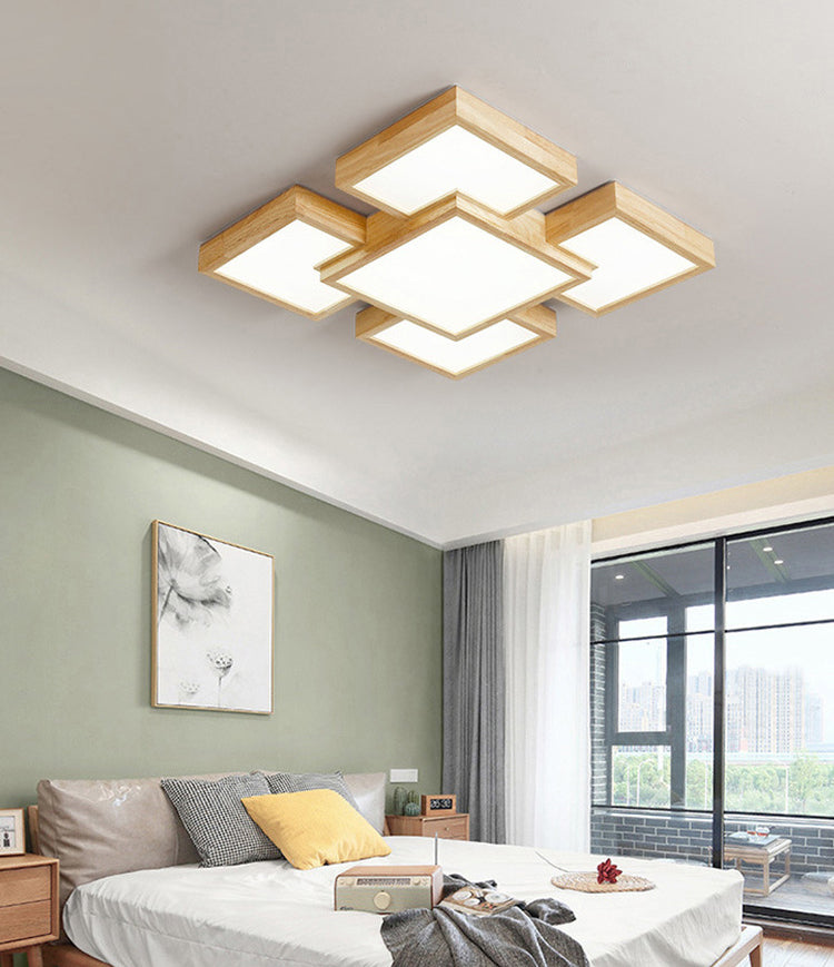 Spleißen von Quadraten in der Nähe der Deckenleuchte. Einfache LED-Schlafzimmer-Deckenleuchte aus Holz aus Holz