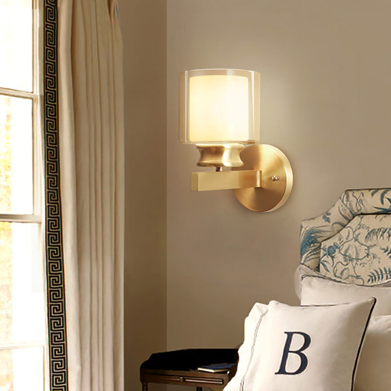 Modern Style Cylindrical Wall Sconce 1 Light Clear and White Glass Wall Mount Lamp in Brass for Bedroom