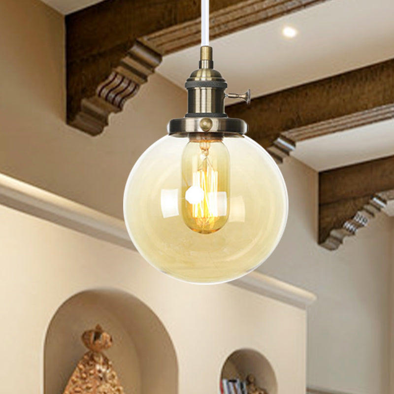 Orbit Hanging Lighting Farmhouse Bernstein/klares Glas 1 Glühbirnenleuchte mit einstellbarem Kabel in Schwarz/Bronze/Messing Finish