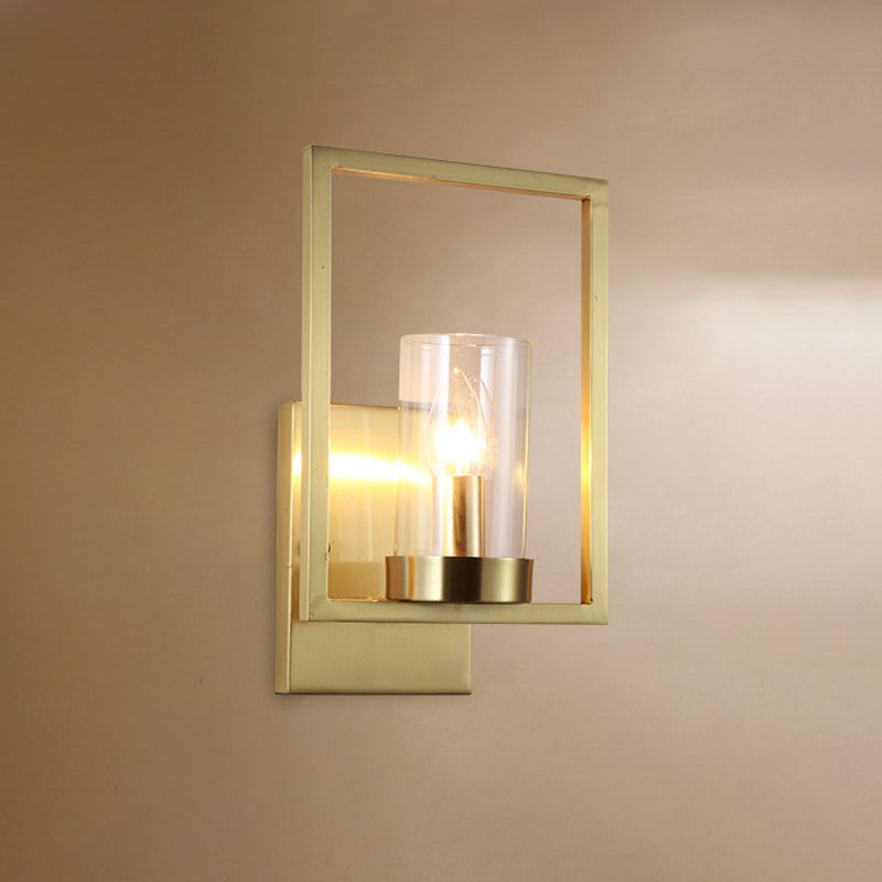 Cylindrical Bedroom Wall Sconce Clear Glass 1 Bulb Contemporary Wall Light Fixture in Brass with Frame