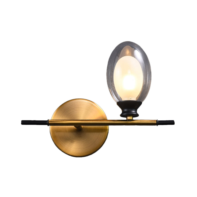 Clear/Amber Glass Egg Shape Wall Light Fixture Minimalist 1 Light Brass Sconce with Horizontal Arm