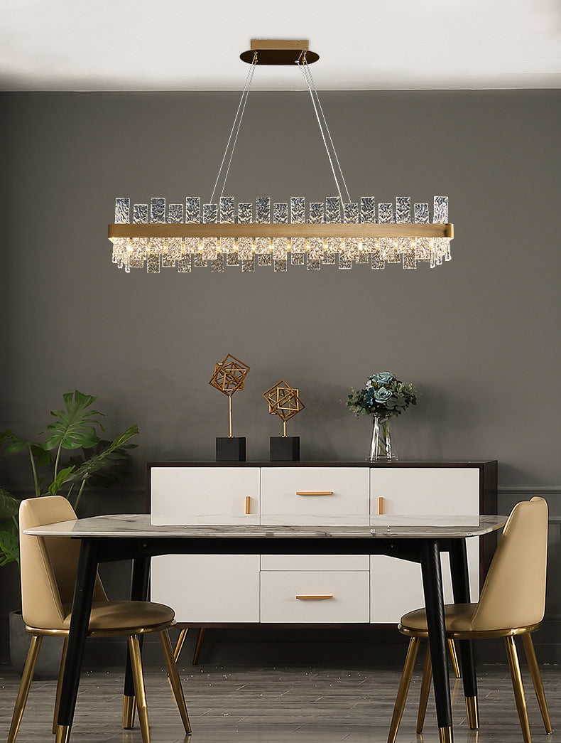 Illuminazione dell'isola rettangolare cristallina increspata luce a led oro minimalista per cena