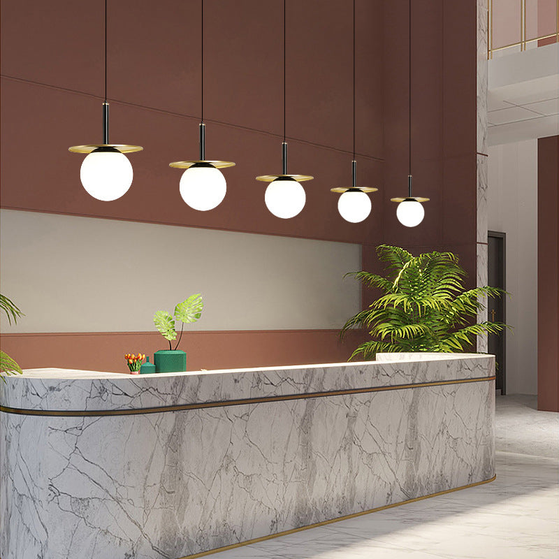 7" Wide White Glass Globe Mini Hanging Light with Round Metal Sheet Decoration Post-modern Style Simplicity Lighting Pendant in Gold