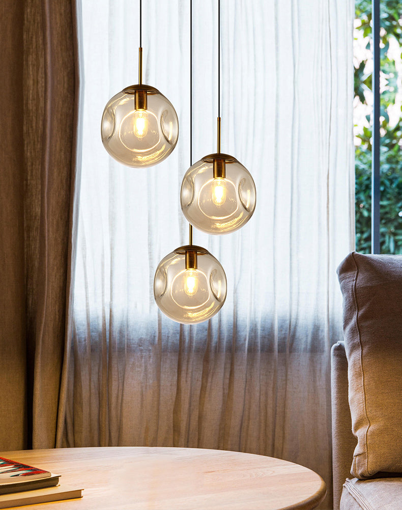 Lámpara de colgación esférica de vidrio con hoyuelos simplicidad de acabado de latón de la cabeza para cenar para cenar