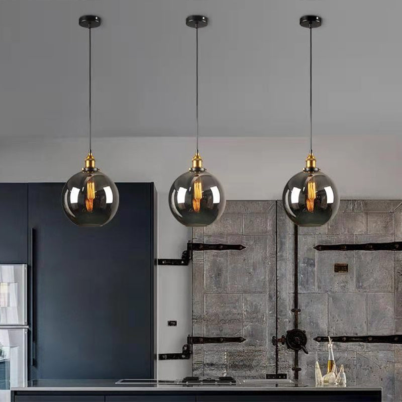 Luce a sospensione a soppalco industriale in vetro trasparente a 1 luci a 1 lutto.