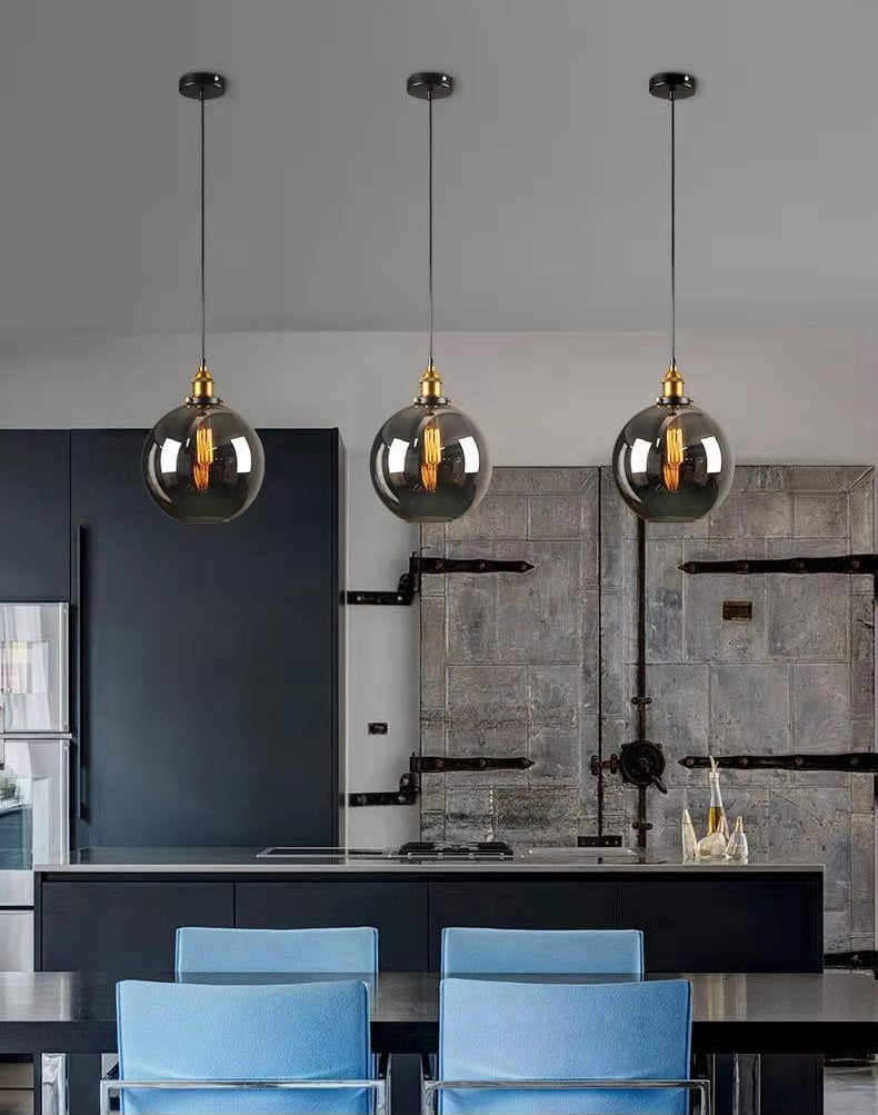 Luce a sospensione a soppalco industriale in vetro trasparente a 1 luci a 1 lutto.