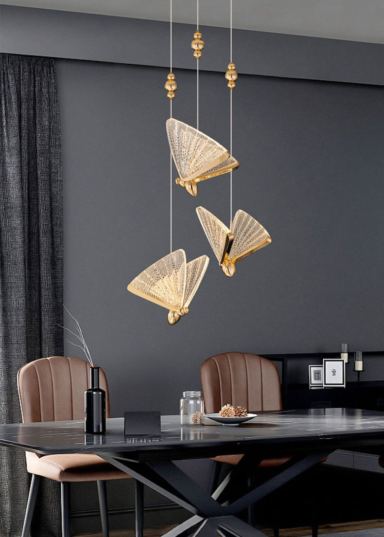 Luz colgante de mariposa dorada en estilo creativo moderno de hierro forjado que colgaba con sombra acrílica