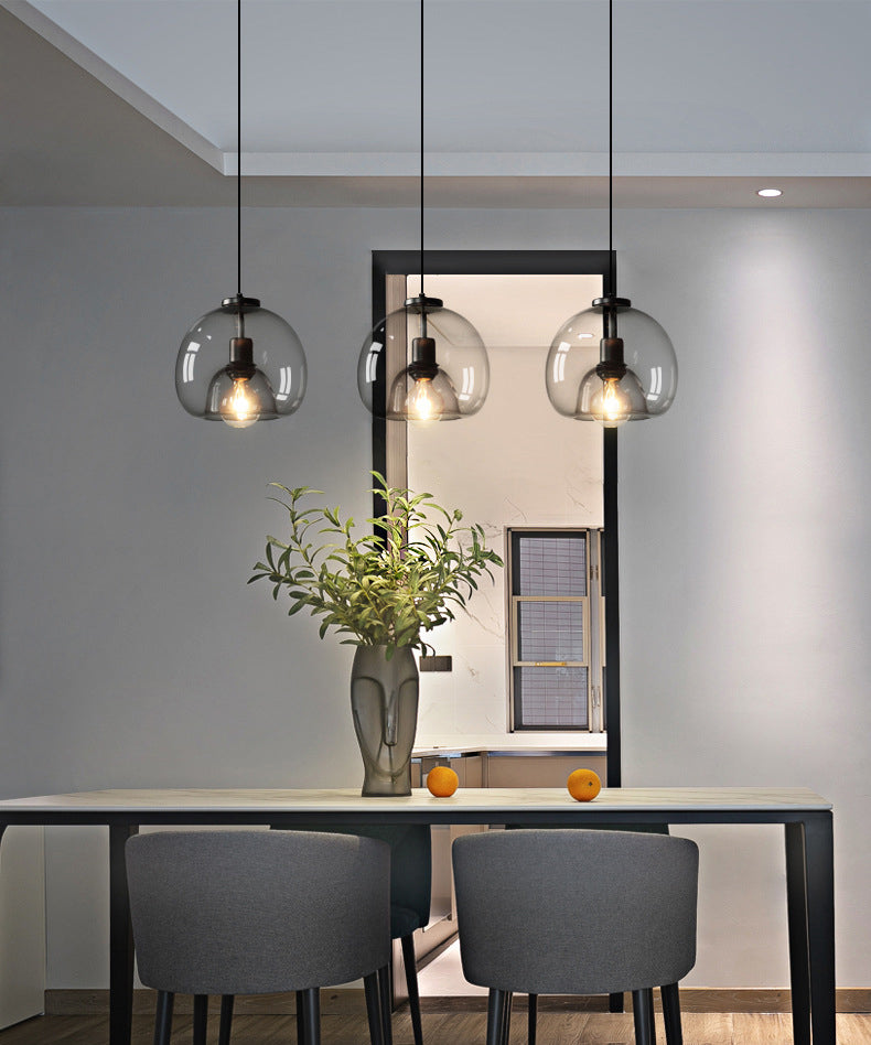 1 luminaire d'éclairage pendentif en verre léger moderne.