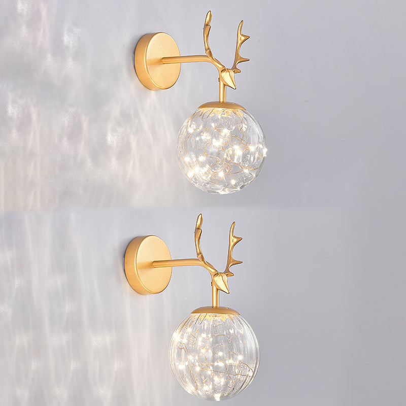 Glass Globe Wall Sconce in Modern Luxury Style Wrought Iron Wall Lamp with Antler Decoration