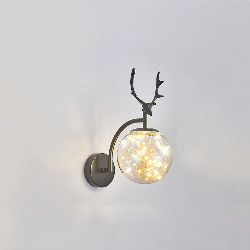 Glass Globe LED Wall Lamp in Modern Fashionable Wrought Iron Wall Sconce with Antler Decoration