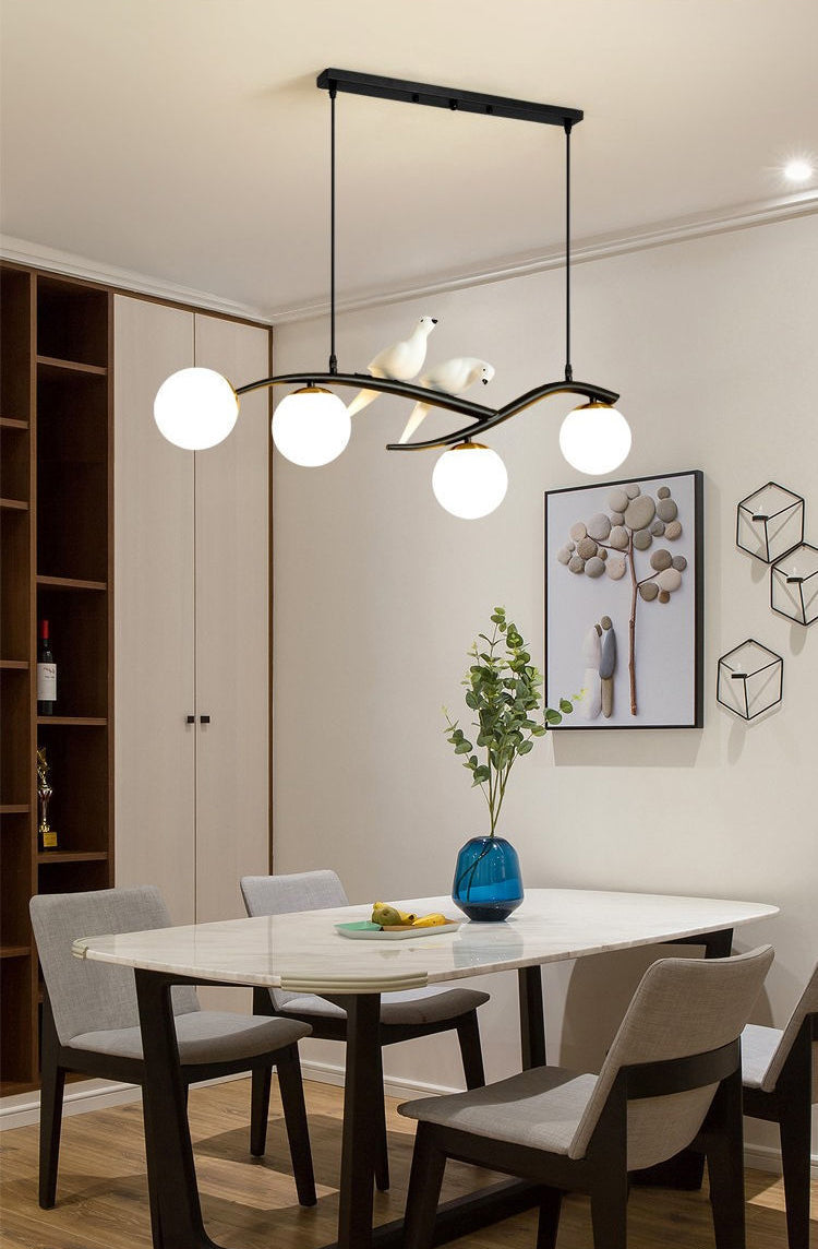 Glass Globe Island Light in Modern Singularity Wrought Iron Pendant Light with Resin Bird Decoration