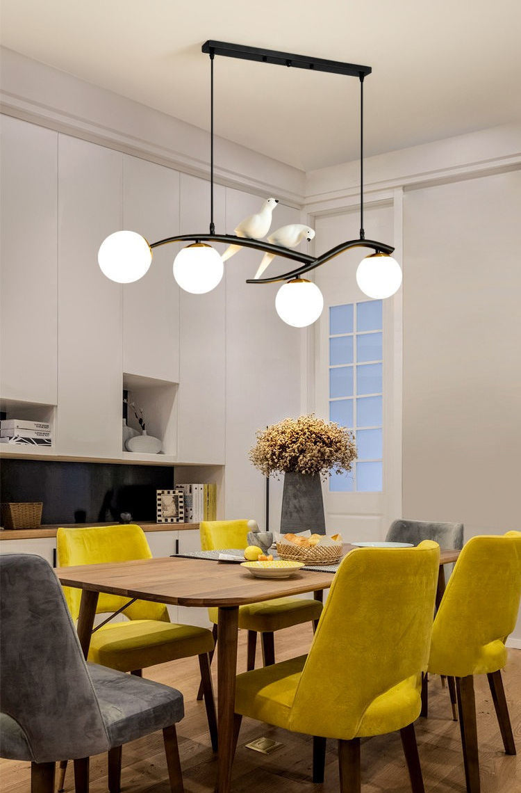 Glass Globe Island Light in Modern Singularity Wrought Iron Pendant Light with Resin Bird Decoration