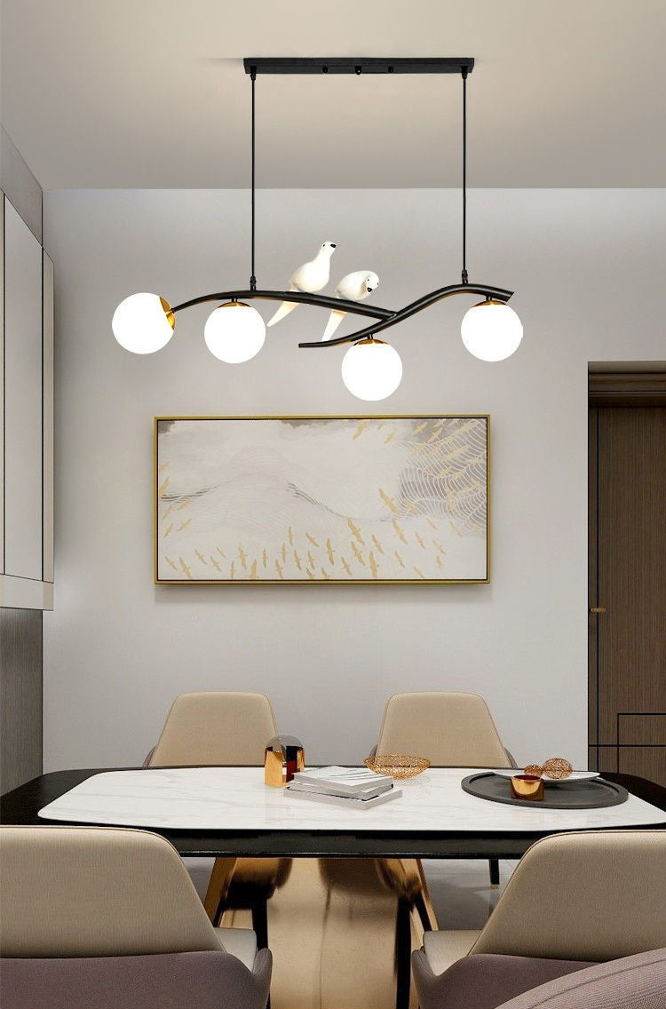 Glass Globe Island Light in Modern Singularity Wrought Iron Pendant Light with Resin Bird Decoration