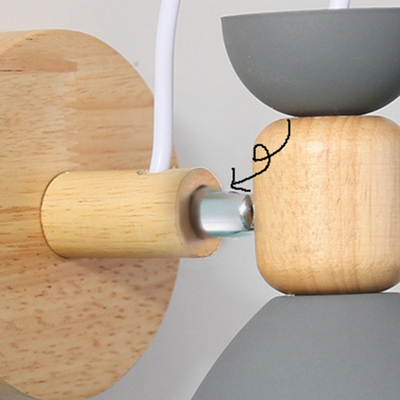 Luz de pared individual geométrica de macarrón en una lámpara de pared de madera de simplicidad moderna con sombra de hierro forjado