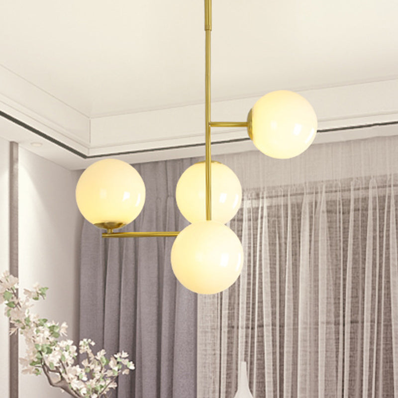 Moderniste 4 têtes Pendant le lustre en or plafond de balle de balle de suspension avec une teinte en verre laiteuse