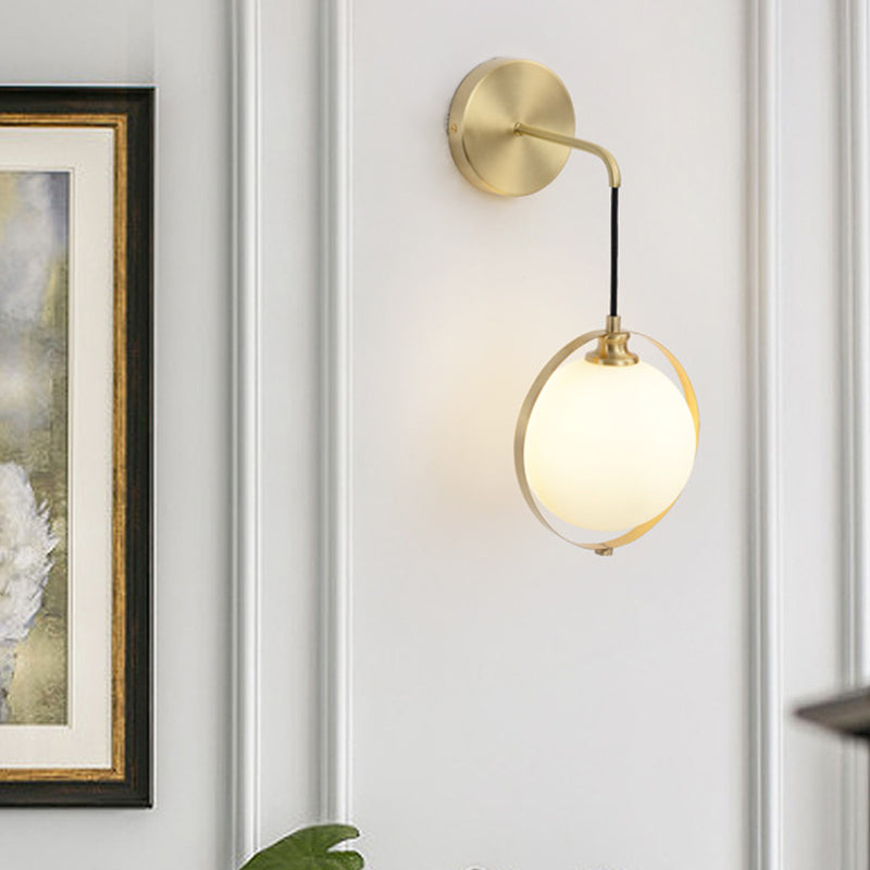 White Glass Ball Sconce Light Modernism 1 Bulb Brass Wall Mount Lamp with Curved Arm