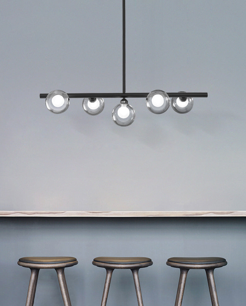 Luz de la isla de vidrio global transparente en el estilo creativo moderno Luz de colgante de hierro forjado para el comedor