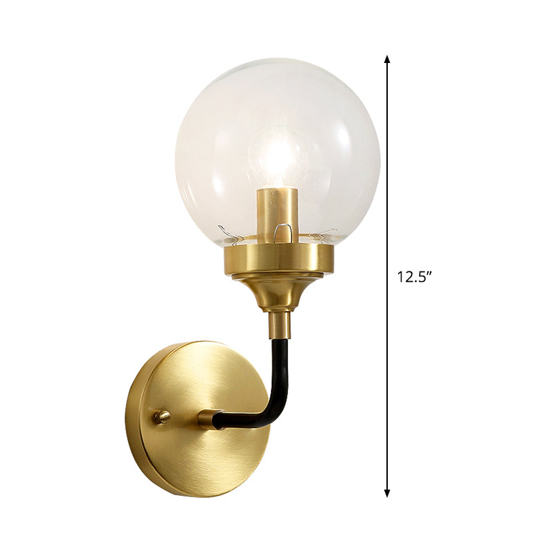 Simple Globe Wall Lighting Clear Glass 1 Bulb Sconce Light Fixture in Brass with Curved Arm