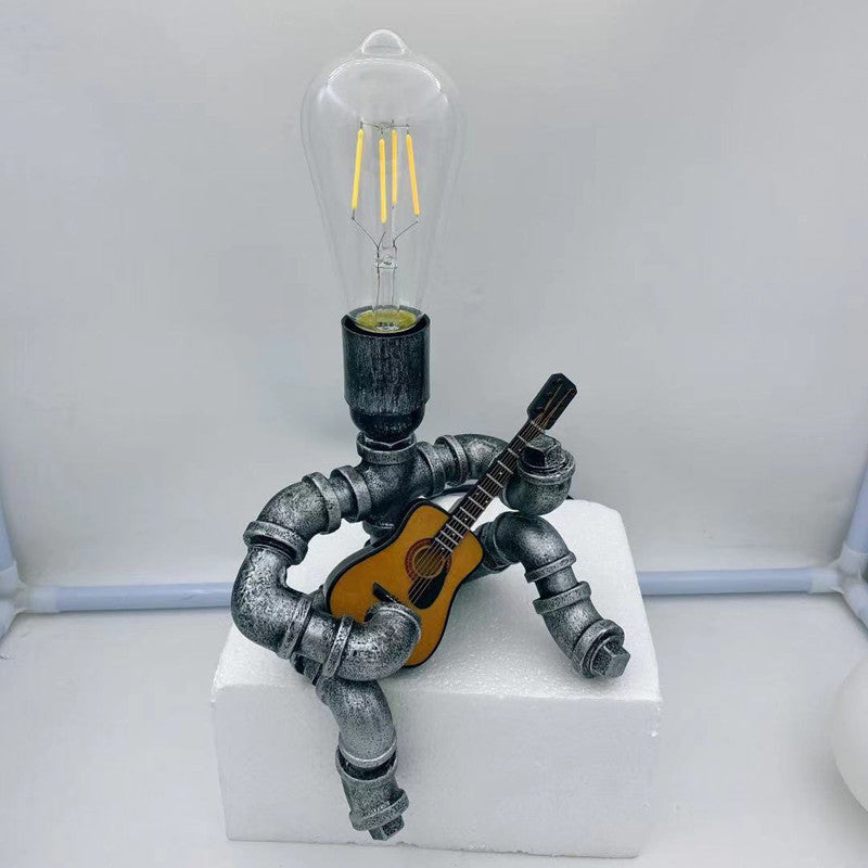 Lampada da comodino per piping creativa industriale a forma di chitarrista a forma di chitarrista per camera da letto per camera da letto