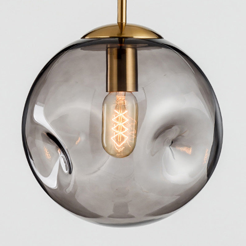 1 pendentif en forme de globe léger avec une nuance en verre fermée