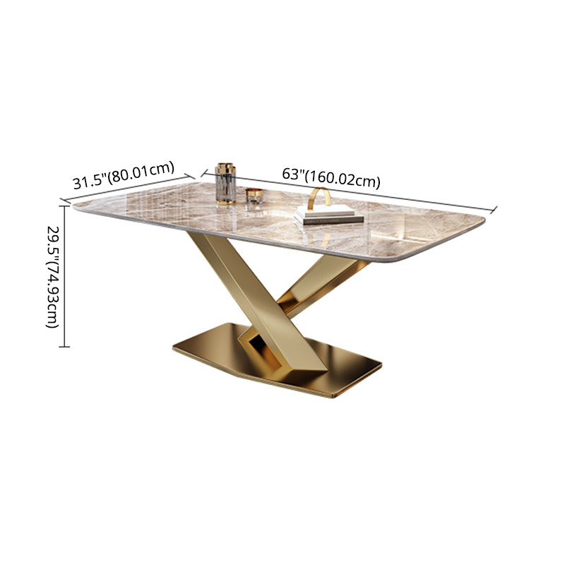 Style minimaliste Ensemble de salle à manger en pierre fritté avec table fixe et base de chevalets en or pour un usage domestique