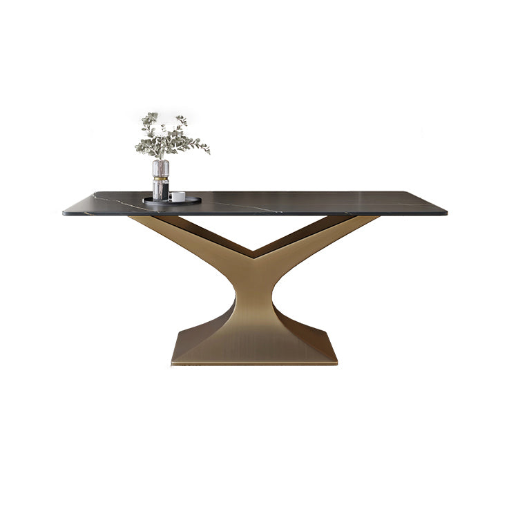 Ensemble de salle à manger minimaliste avec haut de table de pierre fritté et ensemble de table de base d'or