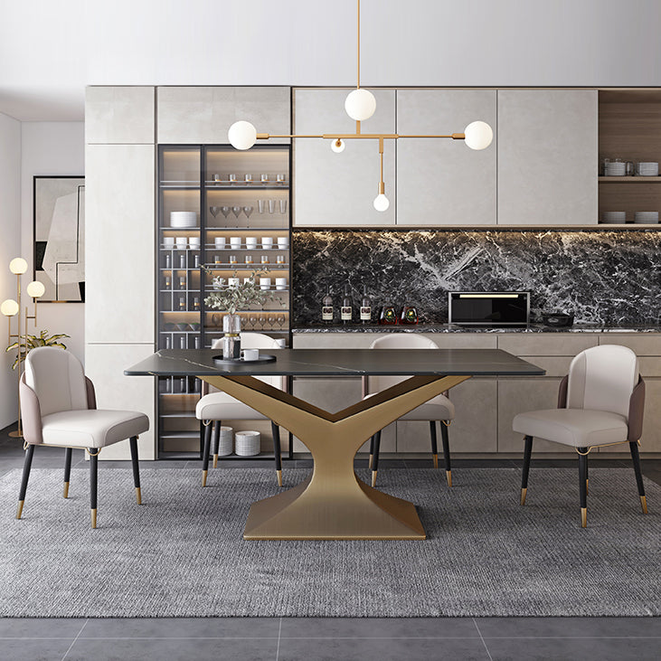 Ensemble de salle à manger minimaliste avec haut de table de pierre fritté et ensemble de table de base d'or