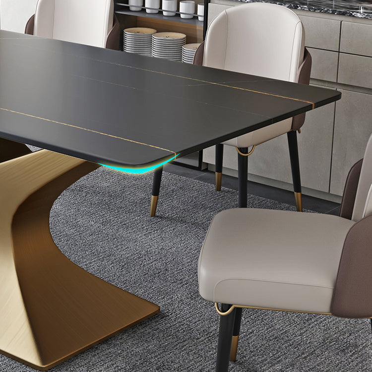 Ensemble de salle à manger minimaliste avec haut de table de pierre fritté et ensemble de table de base d'or