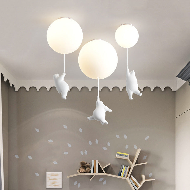White Globe Ceiling Light in Kids Artistic Style Resin Bear Flush Mount with Glass Shade