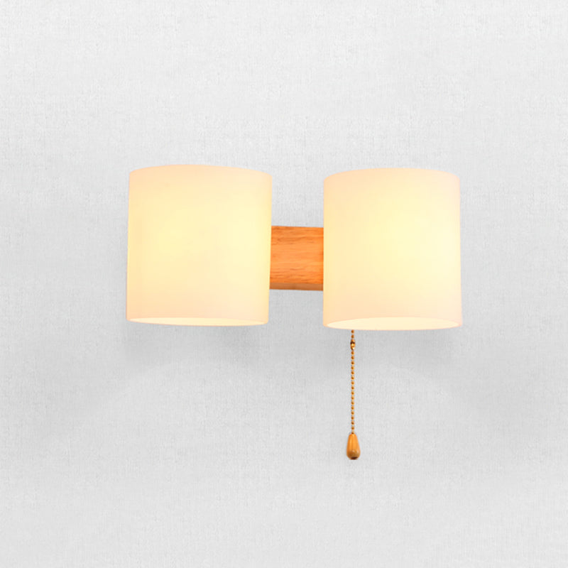 Application murale cylindroïde en bois dans la lampe murale en verre blanche de style concis moderne dans la couleur du journal
