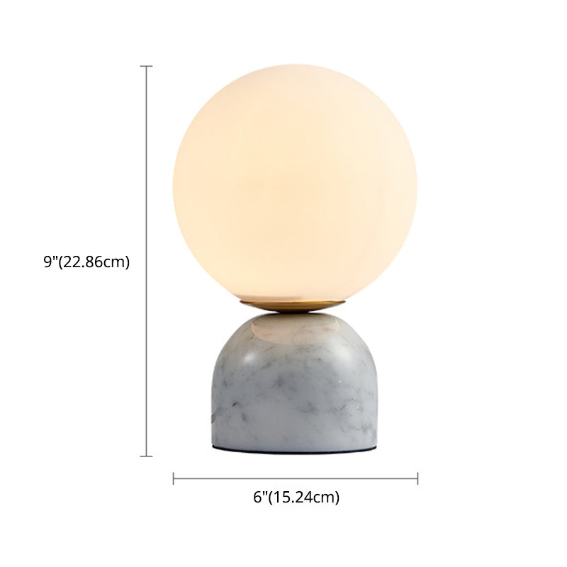 Lámpara de mesa de globo de vidrio en el estilo artístico moderno Luz de mesa de mármol para el dormitorio