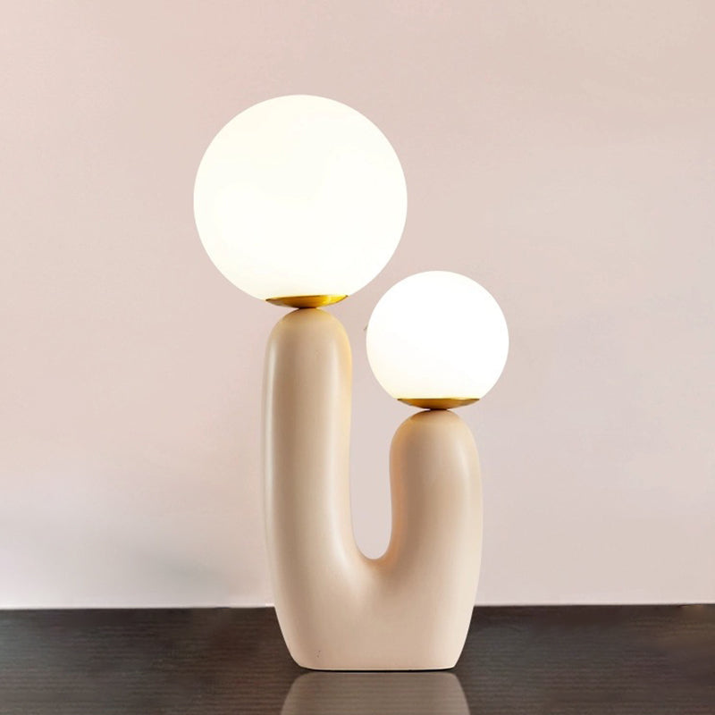 Lumière de table rose à 2 lumières dans la lampe de table en résine laquée de style créatif moderne avec nuance de verre globe