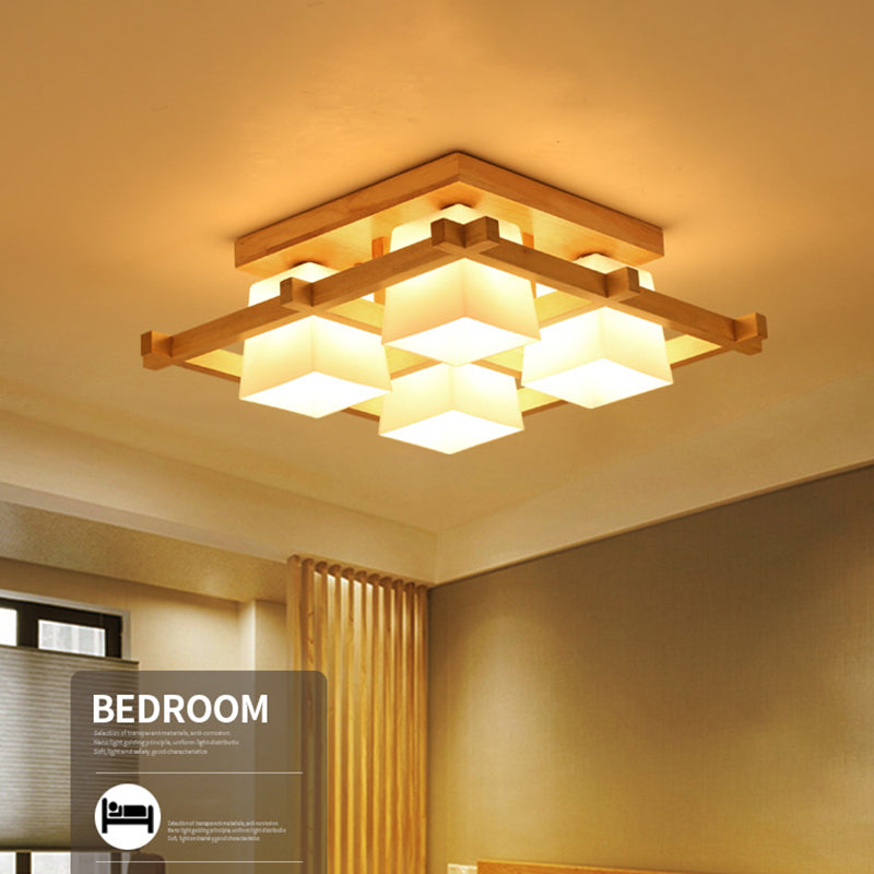 Geometrische Deckenleuchte in Holzfarbe im modernen, prägnanten Stil für den Innenbereich aus Holz mit Glasschirm