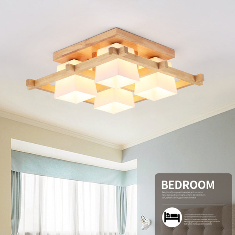 Geometrische Deckenleuchte in Holzfarbe im modernen, prägnanten Stil für den Innenbereich aus Holz mit Glasschirm